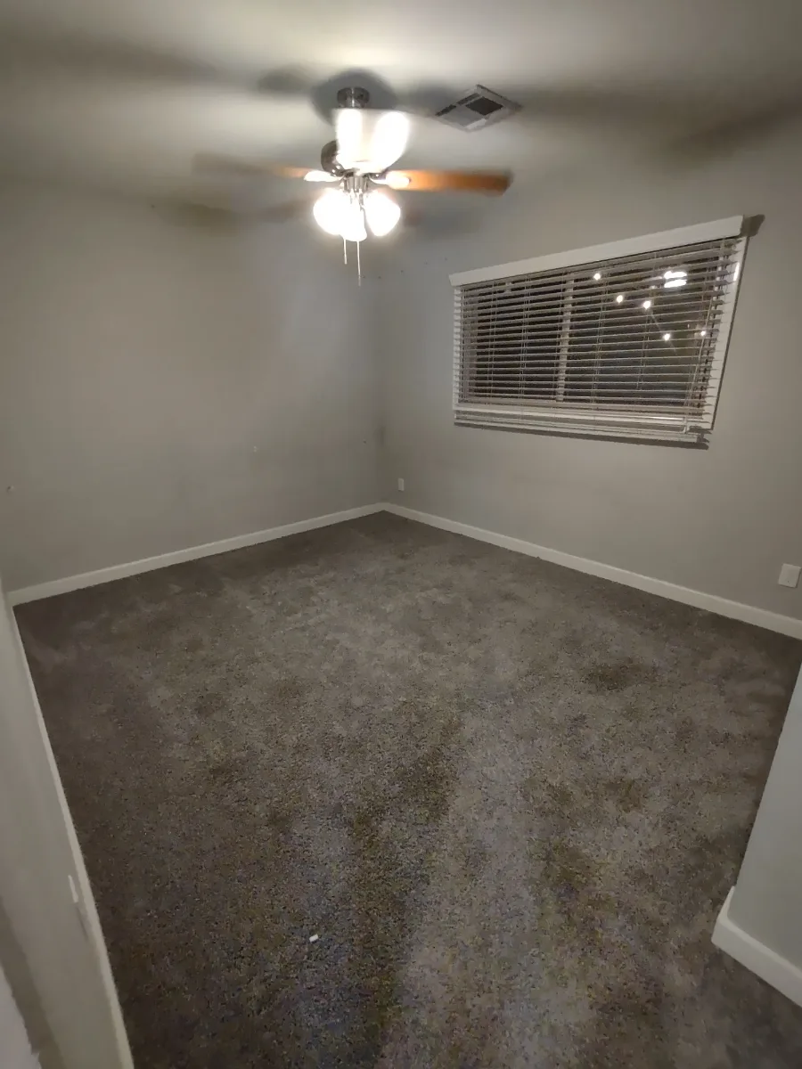 Empty bedroom cleaned for move-out